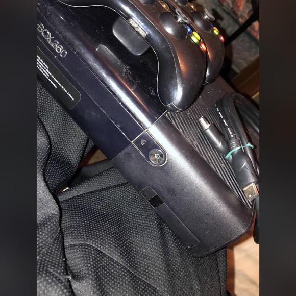 Xbox 360 with two controllers and 65 games. - Picture 2 of 2